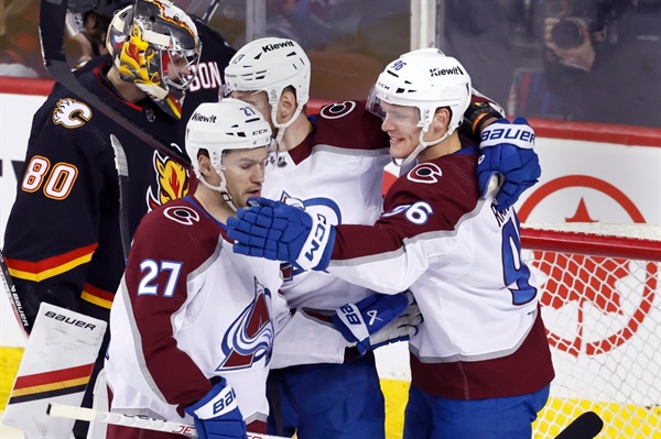 Nathan MacKinnon sets career high, Mikko Rantanen nets four points as Avalanche crush Flames