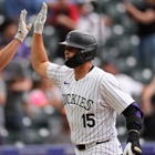 Rockies rally for a wild 10-9 victory over the Padres