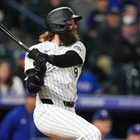 Charlie Blackmon's 2-run double in the 8th inning leads Rockies past Rangers 4-2