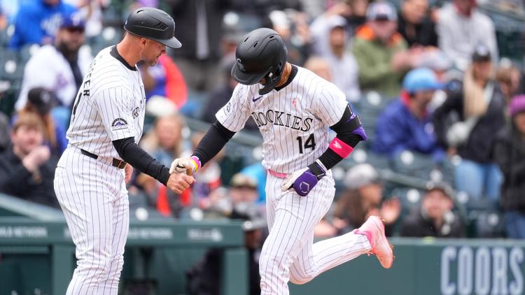 Blach's solid outing, Tovar's homer lift Rockies past Rangers 3-1 to complete series sweep