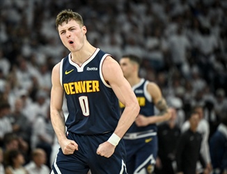 PHOTOS: Denver Nuggets best the Minnesota Timberwolves winning game 4 of the...