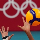 Why does one volleyball player wear a different color jersey at the Olympics?