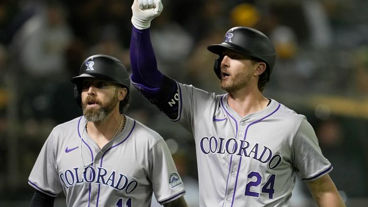 Rockies snap losing skid with win over A's in extra innings