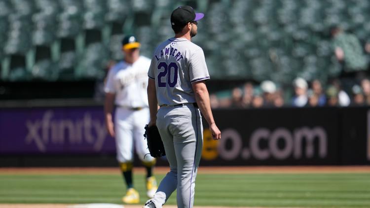 A's hit 2 tying homers in late innings and score 5 in 11th to rally past Rockies