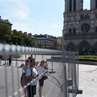 Paris police are sealing off the Seine River ahead of the Olympics Opening Ceremony