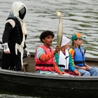 Opening Ceremony: Who is the hooded character with the Olympic torch?