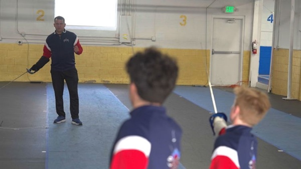 Fencing coach overcomes language barrier to teach Denver students