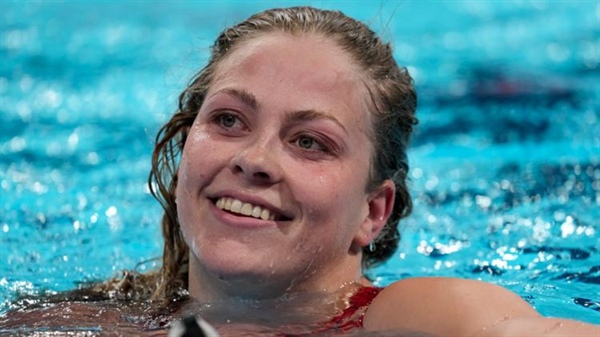 USA swimmer wins medal exactly 32 years after her father did