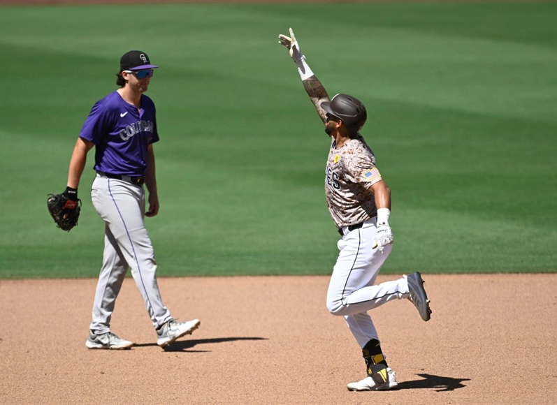 David Peralta hits a homer and robs another as the Padres beat the Rockies 10-2...