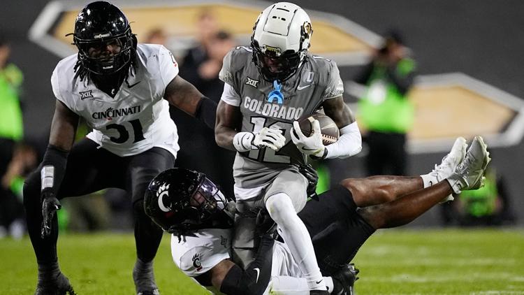 Shedeur Sanders, Travis Hunter help CU beat Cincinnati 34-23 to become bowl eligible